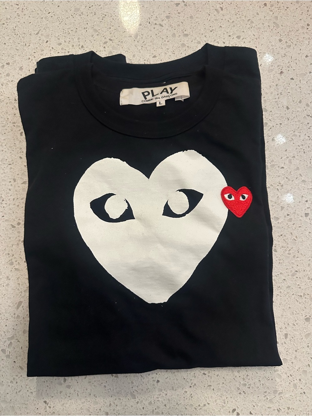 Comme des Garçons PLAY Black Tee with White Heart Graphic and Red Heart Patch